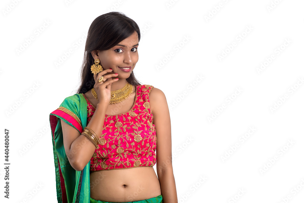 Beautiful Indian traditional girl posing on white background. Beautiful Indian traditional girl posing on white background.