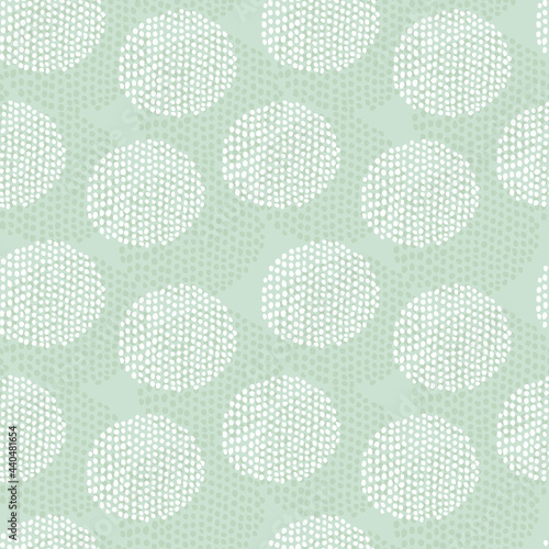 Pale green doodle dots seamless pattern. Pistachio hand drawn repeat background. For fabric, wrapping, invitations, card, scrapbooking or wallpaper.