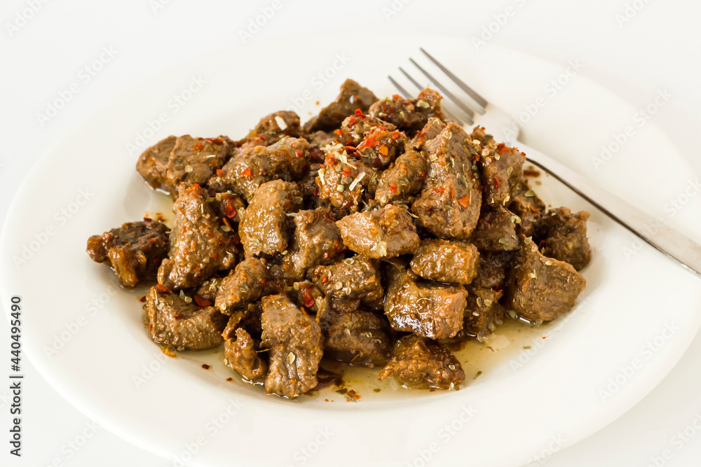 The Sacrifice Festival Food From Turkish Cuisine is braised beef meat,Kavurma on white surface with copy space