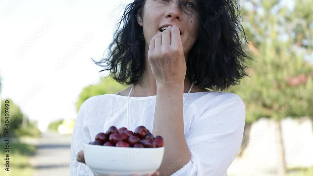 woman eating cherry. Happy day. Happiness. woman eating cherry. Happy day. Happiness.