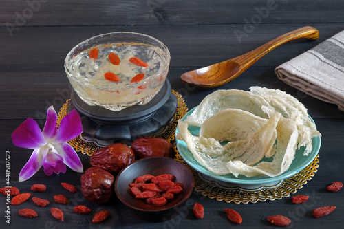 Edible bird's nest, one of most important Chinese traditional  supplements for long life and keep youth. Dried edible bird's nest and cooked in syrup with wolfberry. Copy space photo