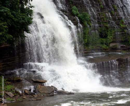 Large waterfalls cascading over rock ledges.