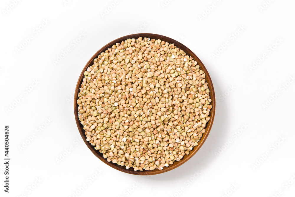 Pile of raw buckwheat isolated on white background. Pile of raw buckwheat isolated on white background.
