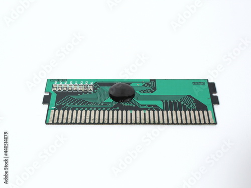 Appearance of old nintendo game cassette after removing the case. Circuit board from old nintendo game console