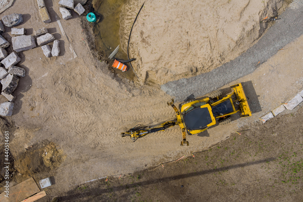 The work with under construction on excavators equipment in the production of earthworks