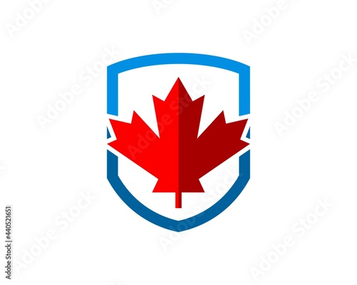 Simple shield with red maple leaf inside