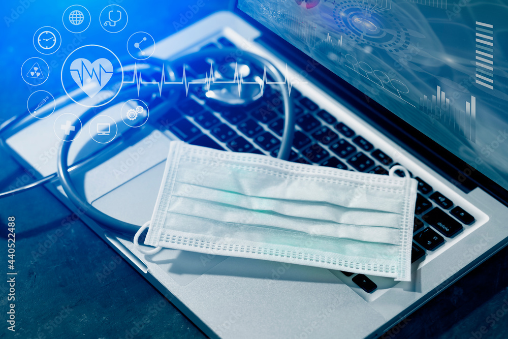 Fototapeta premium Medical technology and futuristic concept. Stethoscope with laptop and healthcare and network connection on hologram modern virtual screen interface icons, 