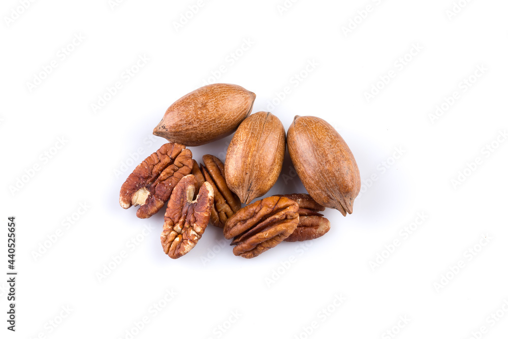 Few pecan nuts isolated on white Few pecan nuts isolated on white