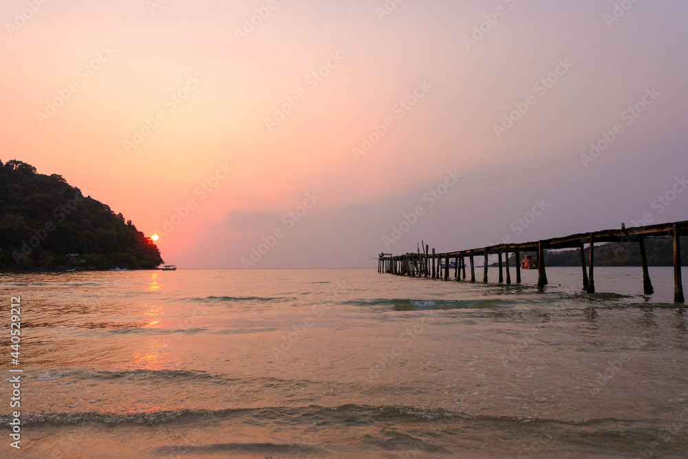 Romantic atmosphere, sunset on the wooden bridge at Koh Kood