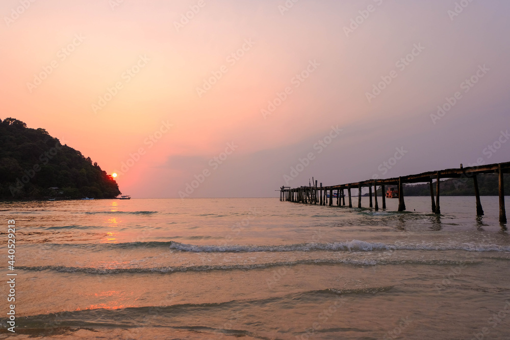 Romantic atmosphere, sunset on the wooden bridge at Koh Kood