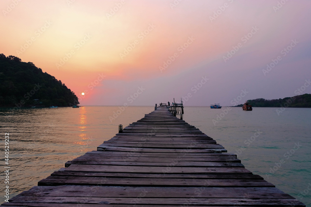 Romantic atmosphere, sunset on the wooden bridge at Koh Kood