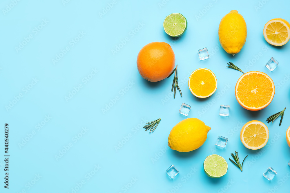 Healthy citrus fruits and ice cubes on color background Healthy citrus fruits and ice cubes on color background