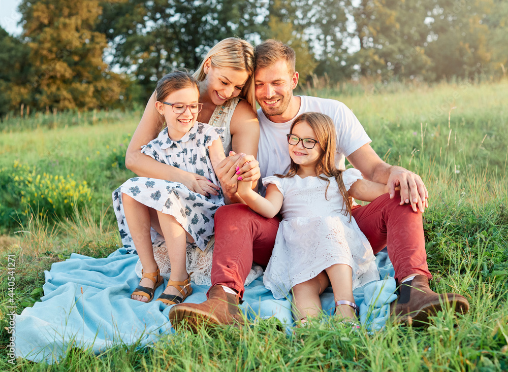 Obraz premium child family portrait outdoor mother woman father girl happy happiness lifestyle having fun bonding