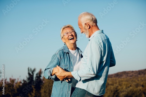 woman man outdoor senior couple happy lifestyle retirement together smiling love old nature mature photo