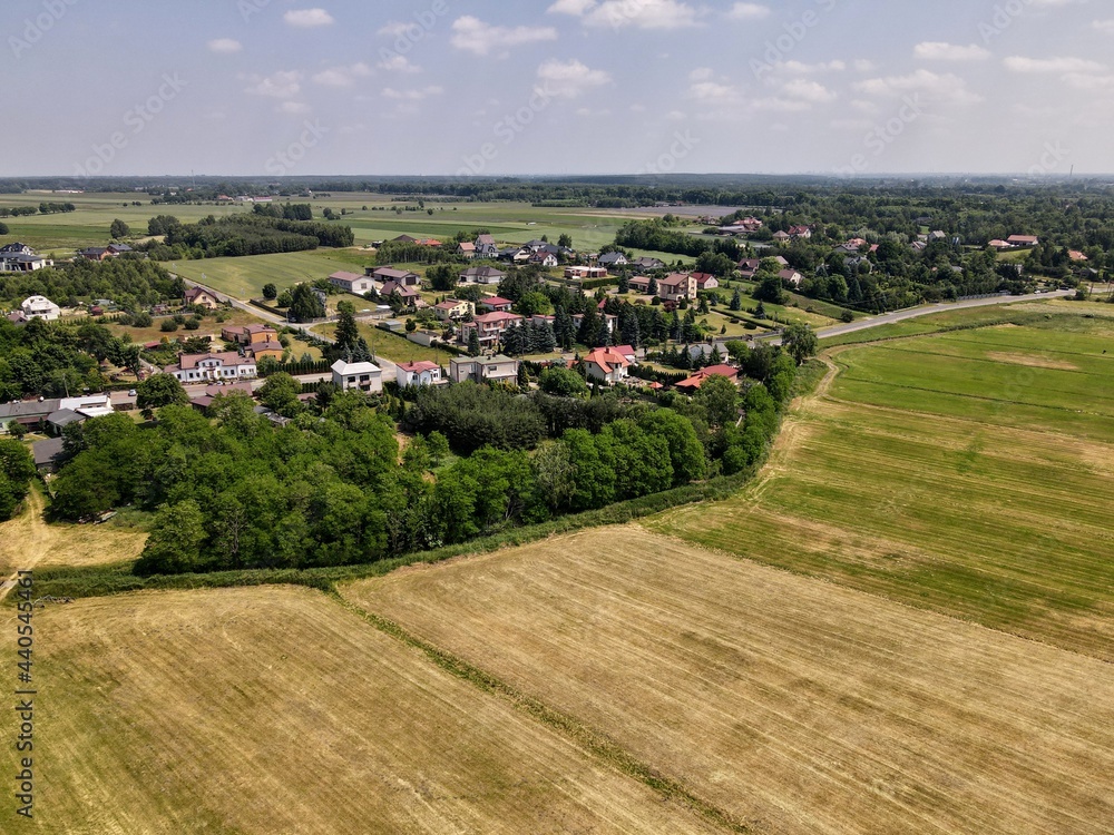 Countryside, farm, fields, meadows seen from above - photo drone 