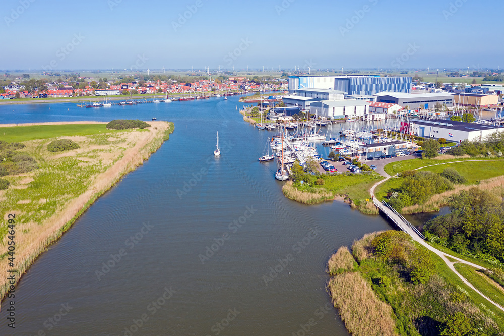 Aerial from the little village and harbor from Workum in Friesland in the Netherlands