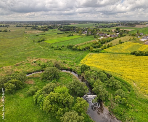 Fotografía Fields, meadows in rural green areas by the river - top view