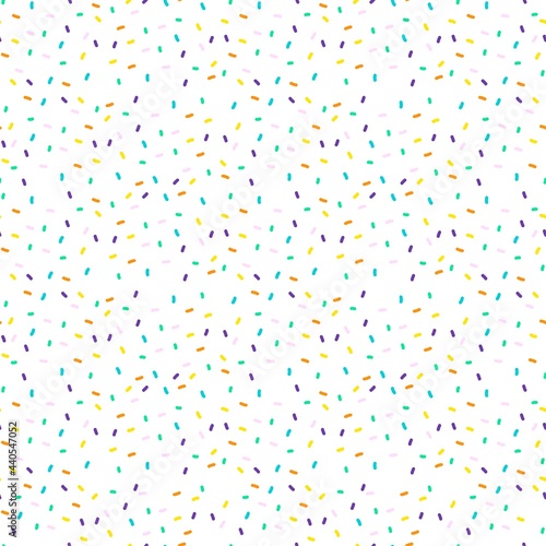Seamless pattern with random repeat colorful confetti.