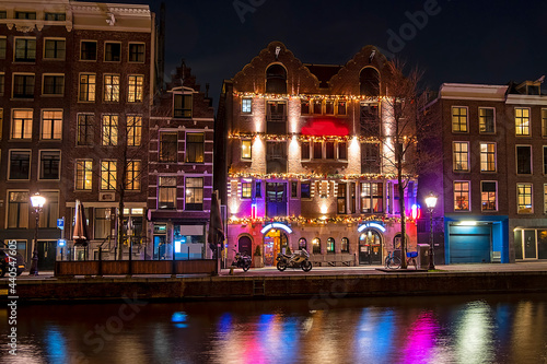 Fotografie Red light district in Amsterdam the Netherlands by night
