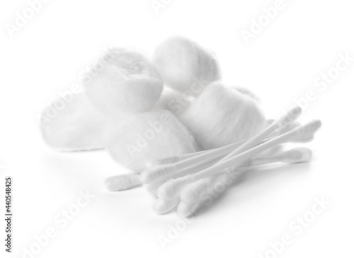 Soft cotton wool and swabs on white background