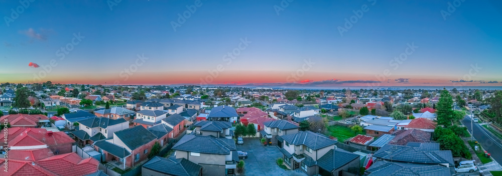 Panoramic aerial Drone view of Melbournes suburbs and CBD looking down at Houses roads and Parks Victoria Australia Panoramic aerial Drone view of Melbournes suburbs and CBD looking down at Houses roads and Parks Victoria Australia