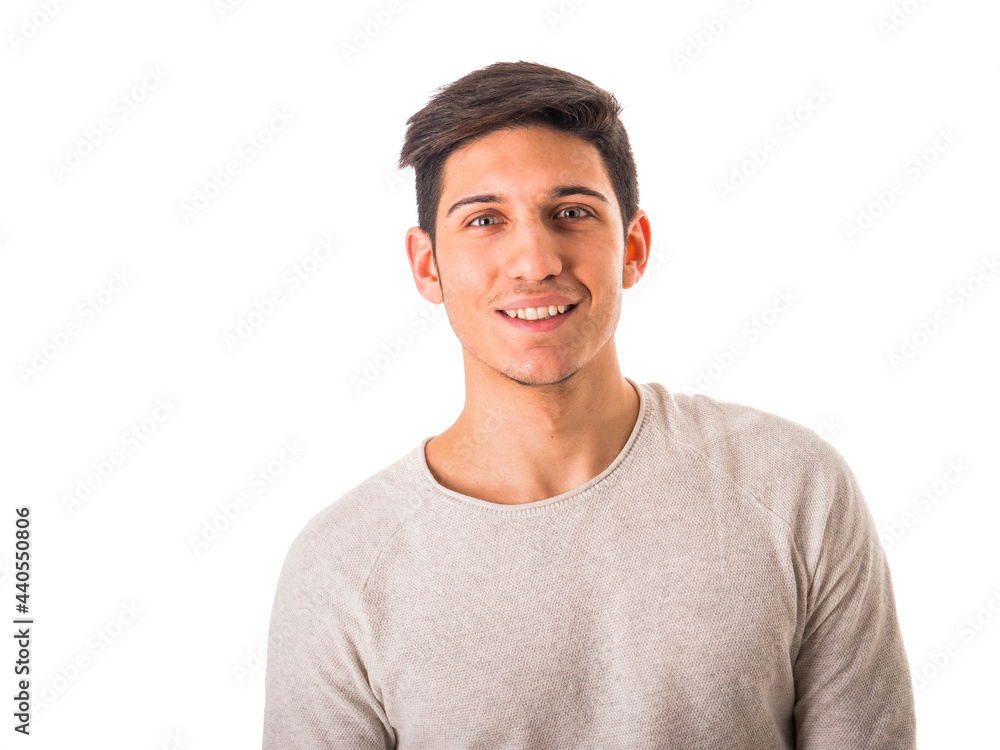 Close-up of handsome young man smiling in studio shot Close-up of handsome young man smiling in studio shot