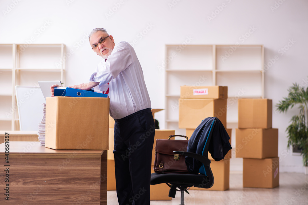 Old businessman employee in relocation concept Old businessman employee in relocation concept