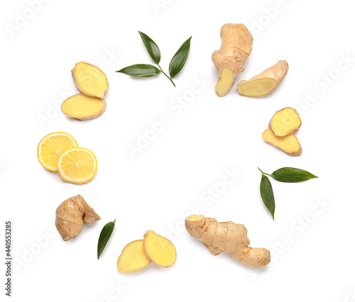 Frame made of fresh ginger and lemon on white background