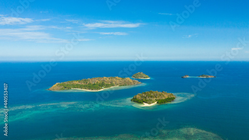 Aerial view of Seascape with beautiful beach and tropical islands. Sallangan Islands, Simoadang Island. Mindanao, Philippines.