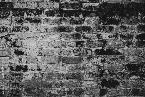 Old dark brick wall texture blocks in black and white concept design for background idea