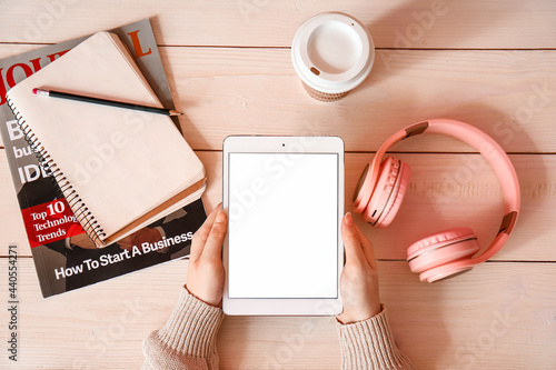 Young woman with tablet com...
