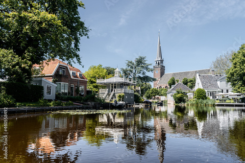 Dutch houses in the typical Dutch town Broek in Waterland, the Netherlands photo