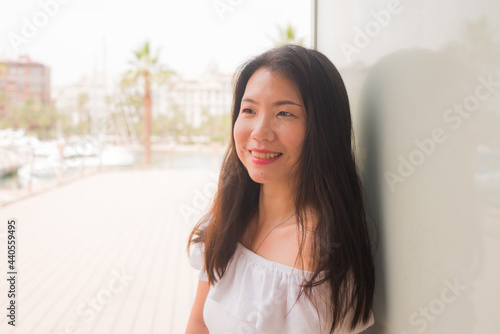 Free Download young happy and attractive Asian woman outdoors - natural portrait of beautiful Chinese girl enjoying sunny day in white Summer dress smiling cheerful - GFXLoad
