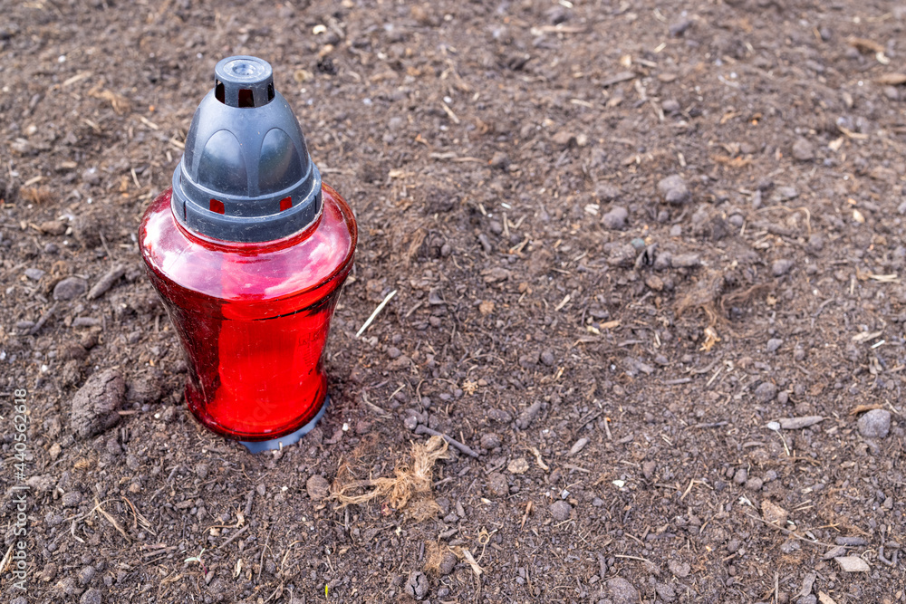 Red grave light on fresh earth Red grave light on fresh earth