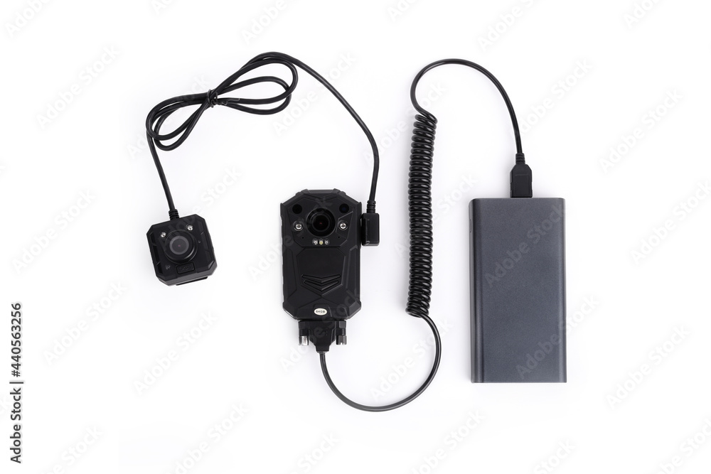 Black body camera, mini camera, spiral cable and Power bank. Officer body cam. Personal Wearable Video Recorder, Portable DVR, camera isolated on white background. Closeup, front view Black body camera, mini camera, spiral cable and Power bank. Officer body cam. Personal Wearable Video Recorder, Portable DVR, camera isolated on white background. Closeup, front view