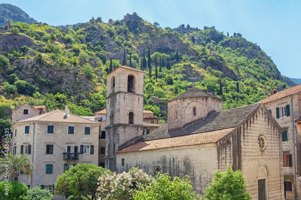 Fototapeta premium Montenegro. Old Town of Kotor - UNESCO World Heritage site. View of ancient Church of St. Mary on sunny summer day