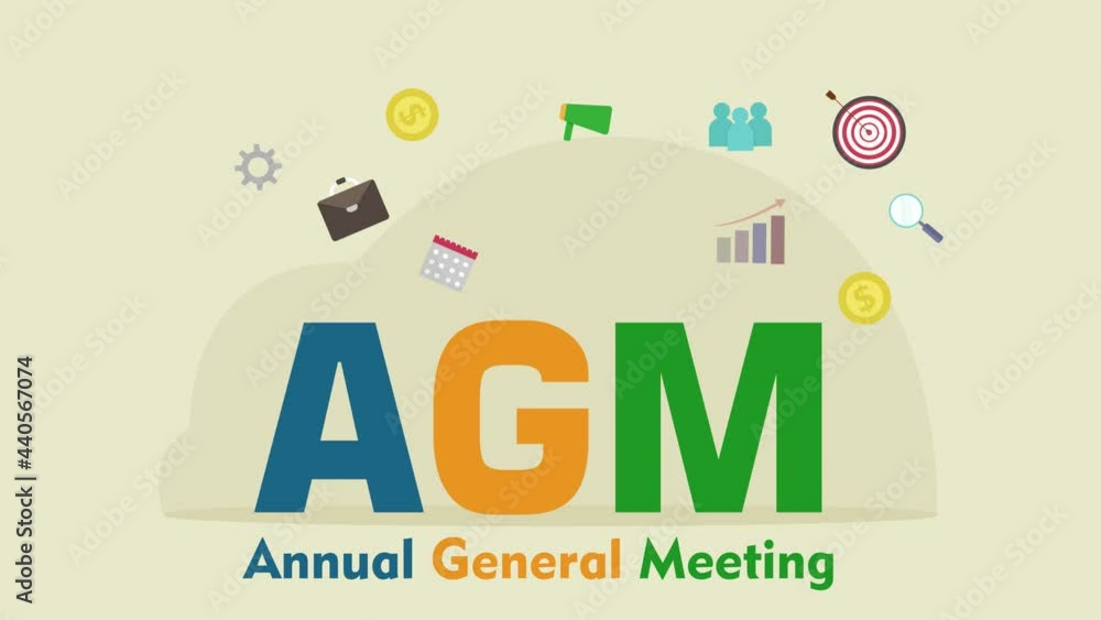 Business team with Annual General Meeting text Business team with Annual General Meeting text