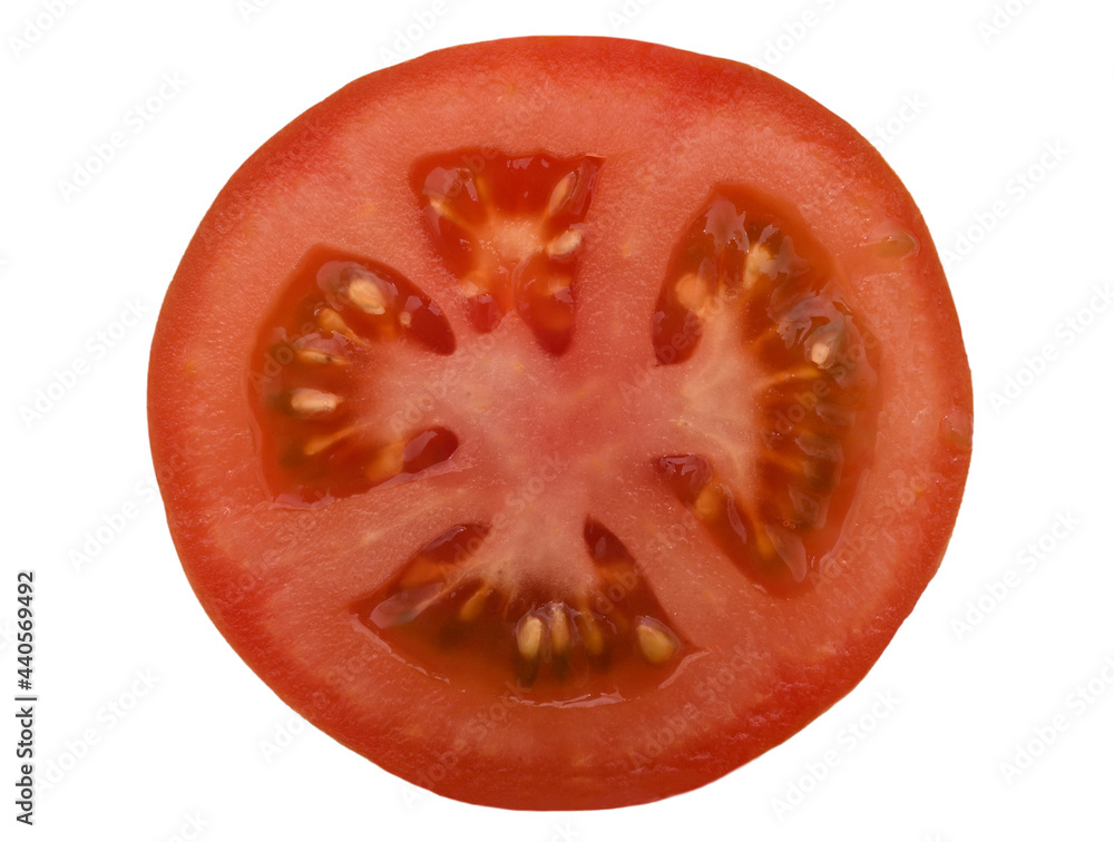 Fresh tomato half isolated on the white background. Close-up. Fresh tomato half isolated on the white background. Close-up.