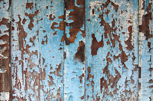 Old wood with crumbled paint background