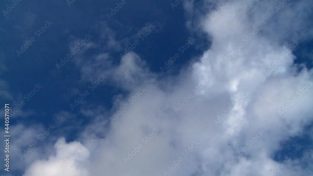 Time lapse, high fluffy clouds over blue sky Time lapse, high fluffy clouds over blue sky