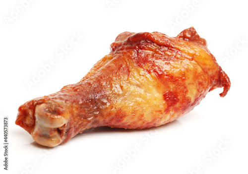 Barbecued chicken leg on white background