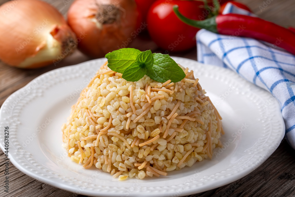 Traditional delicious Turkish food; Bulgur pilaf with vermicelli (Turkish name; sehriyeli bulgur pilaf) Traditional delicious Turkish food; Bulgur pilaf with vermicelli (Turkish name; sehriyeli bulgur pilaf)