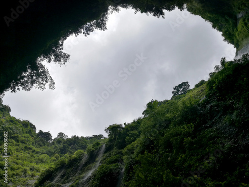 Valley tunnels of Madakaripura waterfall in the area of Bromo Tengger Semeru National Park. It   s the biggest waterfall in East Java Probolinggo Indonesia