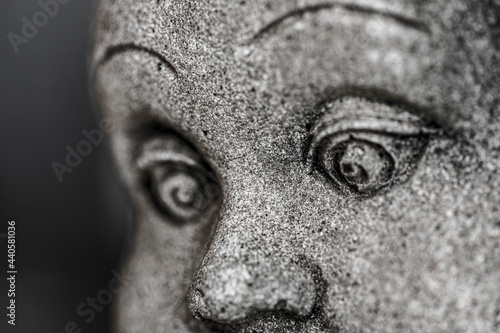close up of a face of a face of a stone