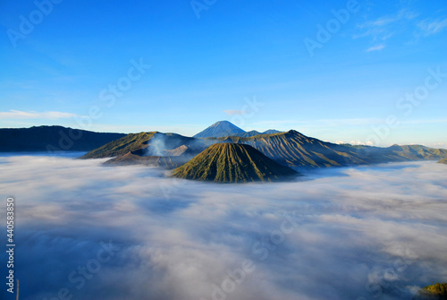 Bromo Mountain and fog around bromo mountain with sunrise from seruni viewpoint is an active volcano and part of the Tengger massif, in East Java, Indonesia. Indonesian call Gunung Bromo. Blue nature