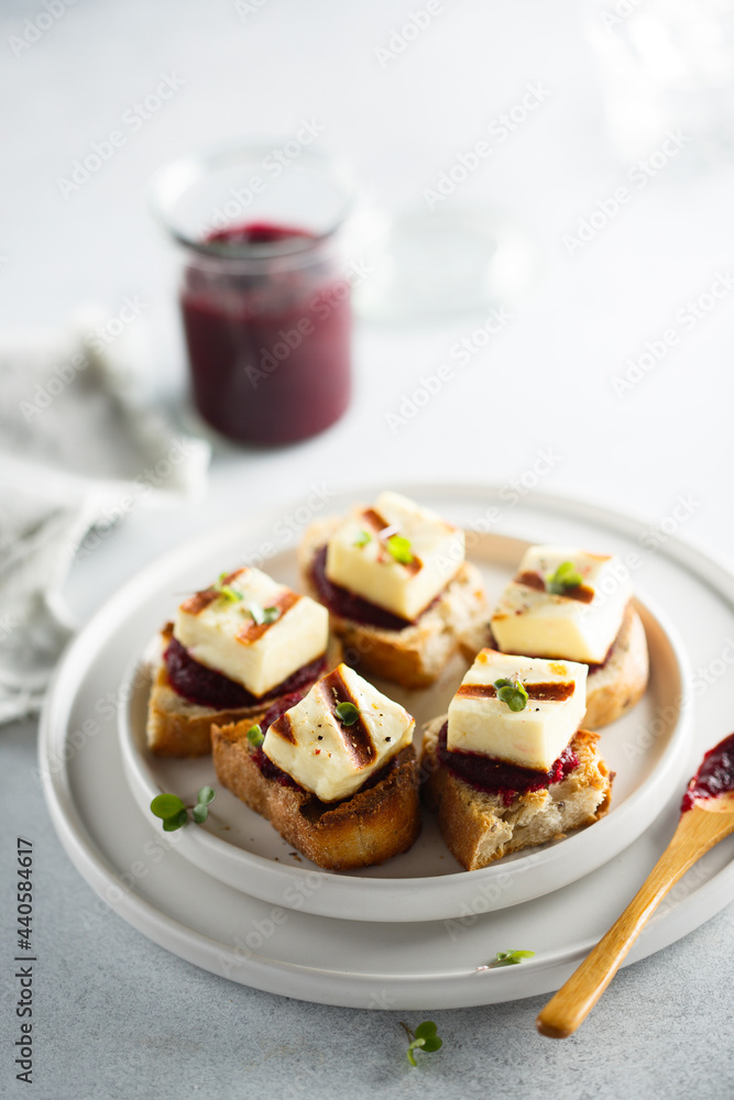 Grilled cheese with beetroot paste on toast