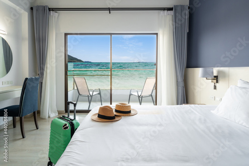 Photography Luxury sea view hotel room with baggage, Travel concept