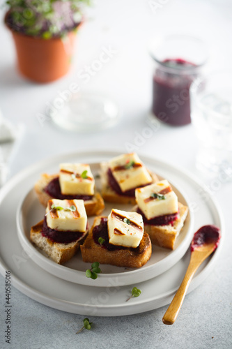 Grilled cheese with beetroot paste on toast