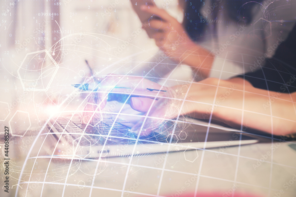 Double exposure of woman hands working on computer and world map hologram drawing. International technology business concept. Double exposure of woman hands working on computer and world map hologram drawing. International technology business concept.