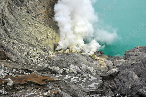 Kawah Ijen volcano and sulfur lake is composite volcanoes in the Banyuwangi Regency of East Java, Indonesia, Kawah ijen have Blue fire crater and Sulfur mining. Blue nature scene park and outdoor 